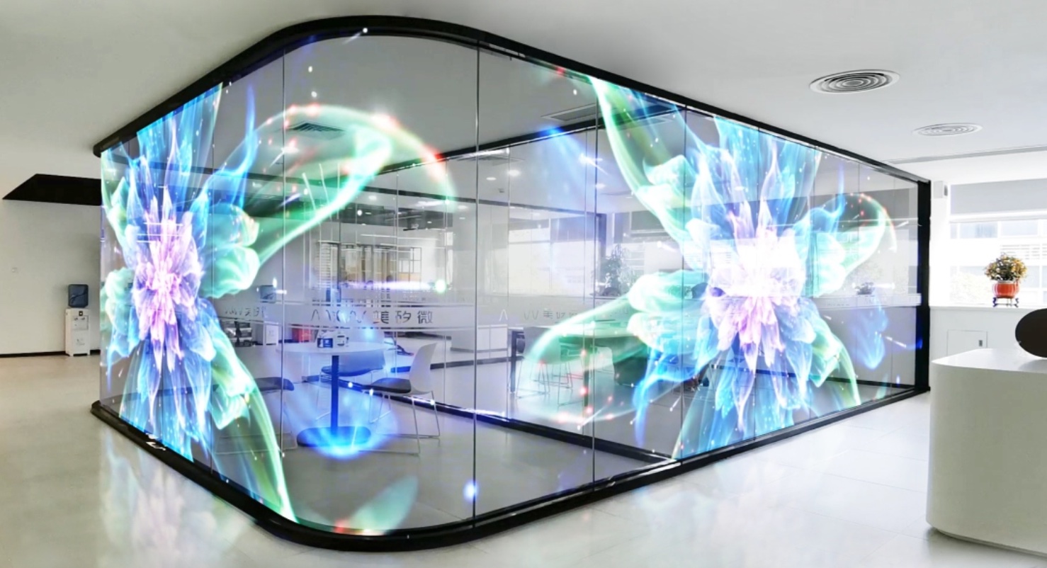 Transparent LED display in a glass-walled meeting room office by Visual Lab, delivering smart presentations and advanced interactive visual communication.Transparent LED display in a glass-walled meeting room office by Visual Lab, delivering smart presentations and advanced interactive visual communication.